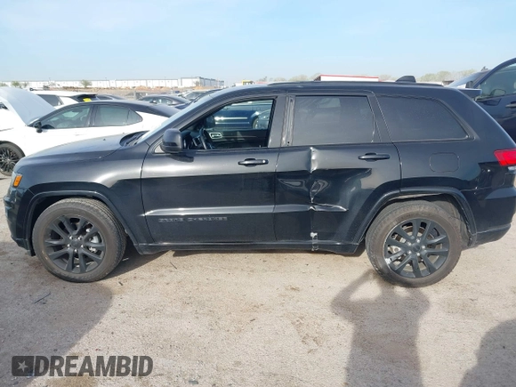 2018 Jeep Grand Cherokee Laredo E with VIN 1C4RJEAG4JC311699, listed as a IAAI auction lot 41876920 with 42,584 mi miles and . Bid and sale history available at DreamBid. Image 14.