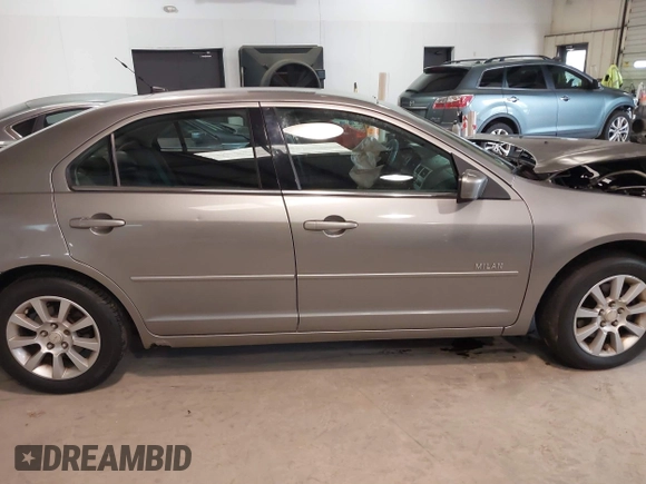 2008 Mercury Milan z VIN 3MEHM01108R641433, wystawiony jako IAAI lot #41504196 z przebiegiem 223 422 mil mil oraz . Historia ofert i sprzedaży dostępna na DreamBid. Obrazek 13.