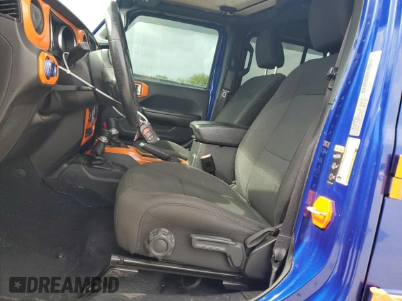 2020 Jeep Wrangler Unlimited Sport S with VIN 1C4HJXDG5LW174535, listed as a Copart auction lot 60888885 with 64,824 mi miles and Salvage title. Bid and sale history available at DreamBid. Image 7.