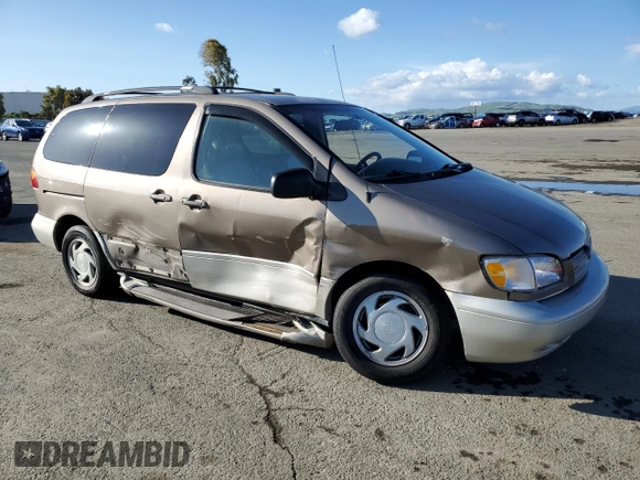 1999 Toyota Sienna LE with VIN 4T3ZF13C5XU144781, listed as a Copart auction lot 48932535 with 216,436 mi miles and Salvage Title. Bid and sale history available at carsss.com. Image 4.