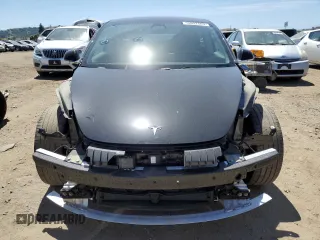 2018 Tesla Model 3 Long Range Battery z VIN 5YJ3E1EBXJF073250, wystawiony jako Copart lot #55832885 z przebiegiem 50 196 mil mil oraz Szkoda całkowita • Salvage title. Historia ofert i sprzedaży dostępna na DreamBid. Obrazek 5.