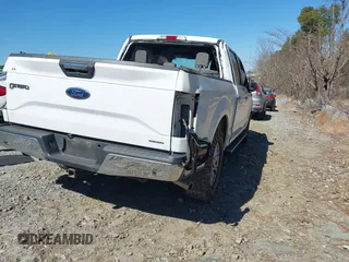 2015 Ford F-150 XLT with VIN 1FTEW1C81FKD70706, listed as a IAAI auction lot 41663865 with 108,124 mi miles and . Bid and sale history available at carsss.com. Image 4.