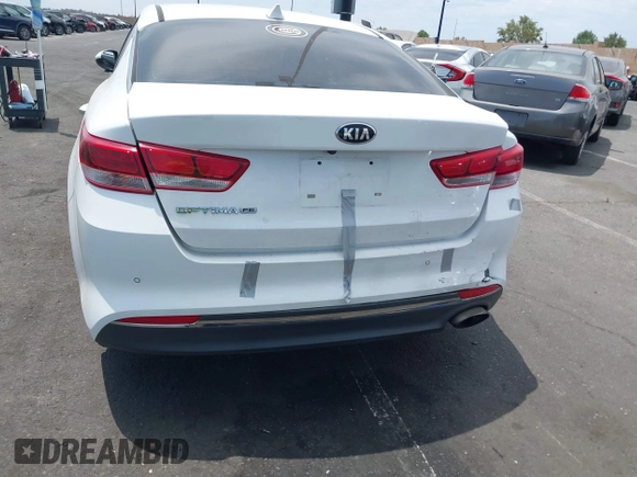 2018 Kia Optima LX z VIN 5XXGT4L32JG213616, wystawiony jako IAAI lot #42408629 z przebiegiem 130 163 mil mil oraz . Historia ofert i sprzedaży dostępna na DreamBid. Obrazek 6.