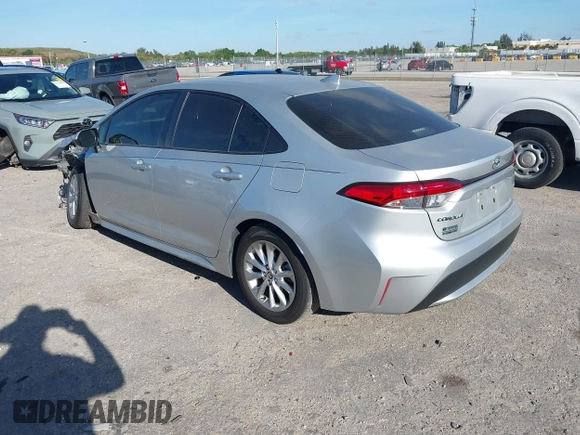 2022 Toyota Corolla LE with VIN JTDVPMAE7N3016592, listed as a IAAI auction lot 41856939 with 28,597 mi miles. Bid and sale history available at carsss.com. Image 3.