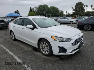 2020 Ford Fusion SE with VIN 3FA6P0LU8LR266753, listed as a Copart auction lot 52341535 with 70,551 mi miles and Salvage title. Bid and sale history available at DreamBid. Image 4.