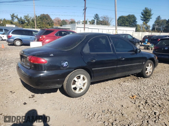 1996 Ford Contour z VIN 1FALP65L5TK212857, wystawiony jako Copart lot #76701614 z przebiegiem 74 994 mil mil oraz Szkody całkowita. Historia ofert i sprzedaży dostępna na DreamBid. Obrazek 3.