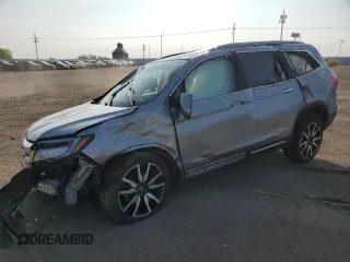 2020 Honda Pilot Touring 7-Passenger with VIN 5FNYF6H63LB000545, listed as a Copart auction lot 59107485 with 58,221 mi miles and Salvage title. Bid and sale history available at DreamBid. Image 1.