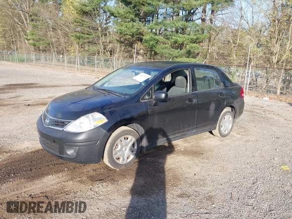 2010 Nissan Versa S with VIN 3N1BC1AP9AL361302, listed as a IAAI auction lot 42102135 with 127,849 mi miles and . Bid and sale history available at DreamBid. Image 2.