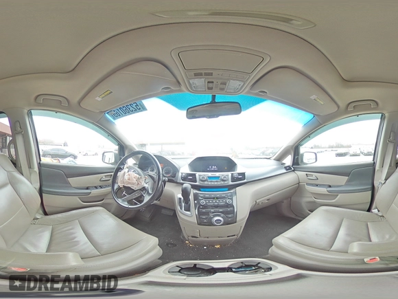 2012 Honda Odyssey Touring with VIN 5FNRL5H9XCB078399, listed as a Copart auction lot 52360165 with 174,819 mi miles and Salvage Title. Bid and sale history available at DreamBid. Image 13.