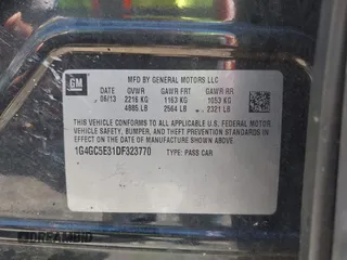 2013 Buick LaCrosse Leather z VIN 1G4GC5E31DF323770, wystawiony jako IAAI lot #42247069 z przebiegiem Nie podano mil oraz . Historia ofert i sprzedaży dostępna na DreamBid. Obrazek 9.