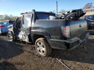 2010 Honda Ridgeline RTL with VIN 5FPYK1F58AB003793, listed as a Copart auction lot 76534474 with 0 mi miles and Salvage Title. Bid and sale history available at carsss.com. Image 2.
