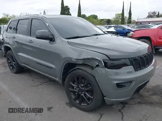 2021 Jeep Grand Cherokee Laredo X with VIN 1C4RJFAG4MC677429, listed as a IAAI auction lot 42052278 with 26,506 mi miles and . Bid and sale history available at DreamBid. Image 1.