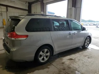 2013 Toyota Sienna LE AAS with VIN 5TDKK3DC5DS290764, listed as a Copart auction lot 60247735 with 143,014 mi miles and Clean title. Bid and sale history available at DreamBid. Image 3.