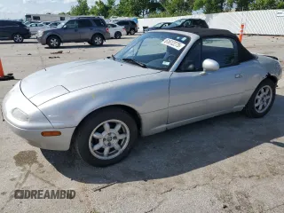 1991 Mazda MX-5 Miata Special Edition with VIN JM1NA3510M1241143, listed as a Copart auction lot 61612275 with 201,803 mi miles and Salvage title. Bid and sale history available at DreamBid. Image 1.