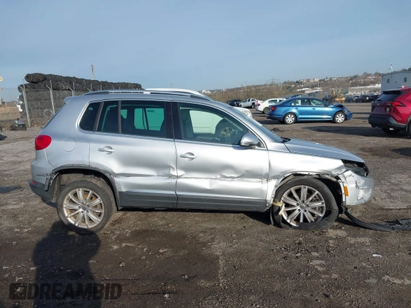 2013 Volkswagen Tiguan S with VIN WVGAV3AX0DW572915, listed as a IAAI auction lot 41937763 with 65,136 mi miles and . Bid and sale history available at DreamBid. Image 6.