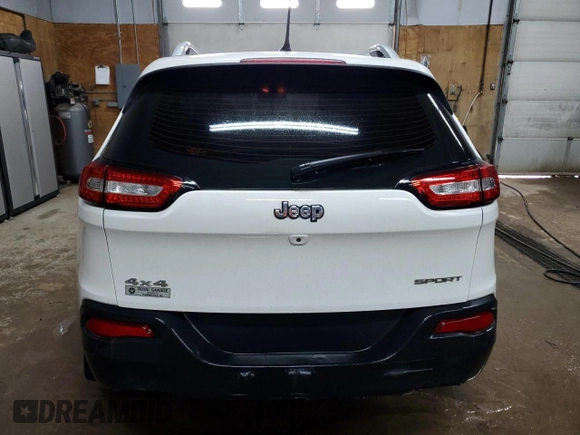 2016 Jeep Cherokee Sport with VIN 1C4PJMAB5GW109080, listed as a Copart auction lot 49871945 with 223,719 mi miles and Clean Title. Bid and sale history available at carsss.com. Image 6.