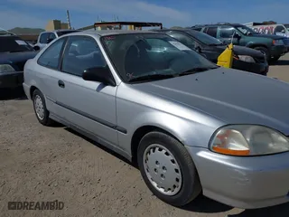 1997 Honda Civic DX with VIN 1HGEJ6220VL106203, listed as a IAAI auction lot 42098813 with 192,343 mi miles. Bid and sale history available at carsss.com. Image 12.
