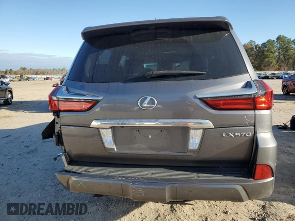 2017 Lexus LX 570 with VIN JTJHY7AX3H4228219, listed as a Copart auction lot 84943634 with 94,413 mi miles and Salvage title. Bid and sale history available at DreamBid. Image 6.