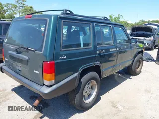 2000 Jeep Cherokee SE with VIN 1J4FF28S0YL236369, listed as a IAAI auction lot 42314386 with 159,005 mi miles and . Bid and sale history available at DreamBid. Image 4.