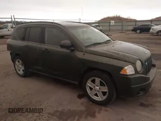 2007 Jeep Compass Sport with VIN 1J8FT47W77D221755, listed as a IAAI auction lot 41826458 with 205,072 mi miles. Bid and sale history available at carsss.com. Image 1.