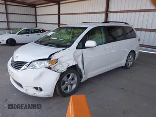 2014 Toyota Sienna LE AAS with VIN 5TDKK3DC2ES434546, listed as a IAAI auction lot 42227745 with 175,445 mi miles and . Bid and sale history available at DreamBid. Image 2.