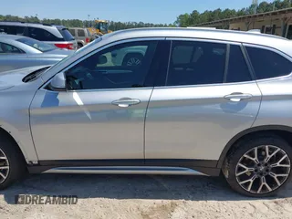 2021 BMW X1 sDrive28i with VIN WBXJG7C06M5T14235, listed as a IAAI auction lot 42021762 with 53,384 mi miles and . Bid and sale history available at DreamBid. Image 14.