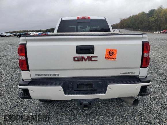 2019 GMC Sierra 2500HD Denali z VIN 1GT12SEY8KF150379, wystawiony jako Copart lot #80525704 z przebiegiem Nie podano mil oraz Szkoda całkowita • Salvage title. Historia ofert i sprzedaży dostępna na DreamBid. Obrazek 6.