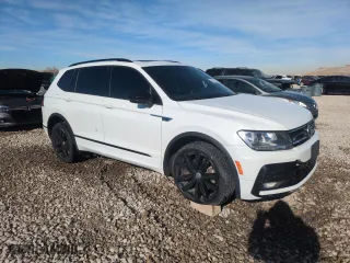 2021 Volkswagen Tiguan SE with VIN 3VV2B7AX9MM122870, listed as a Copart auction lot 42031515 with 77,651 mi miles and Salvage Title. Bid and sale history available at carsss.com. Image 4.