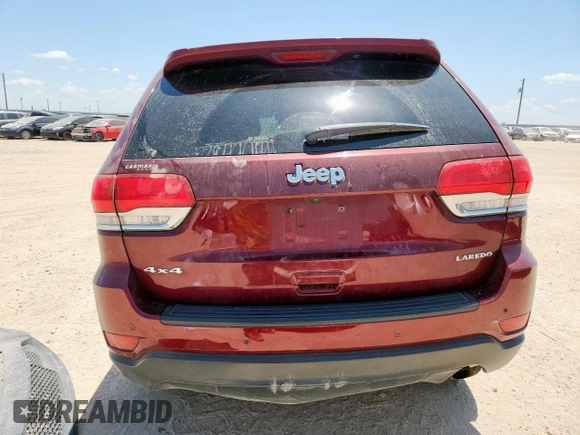 2017 Jeep Grand Cherokee Laredo with VIN 1C4RJFAG7HC693789, listed as a Copart auction lot 61827925 with 143,019 mi miles and Salvage title. Bid and sale history available at DreamBid. Image 6.