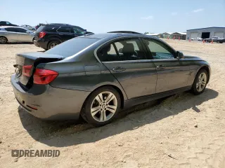 2018 BMW 3 Series 330i with VIN WBA8B9G55JNU99642, listed as a Copart auction lot 53822805 with 142,833 mi miles and Salvage title. Bid and sale history available at DreamBid. Image 3.