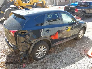 2014 Mazda CX-5 Touring with VIN JM3KE4CY8E0333029, listed as a IAAI auction lot 41857199 with 218,887 mi miles. Bid and sale history available at carsss.com. Image 4.