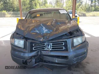 2007 Honda Ridgeline RTL with VIN 2HJYK16537H529904, listed as a IAAI auction lot 42626859 with 294,953 mi miles and . Bid and sale history available at DreamBid. Image 12.