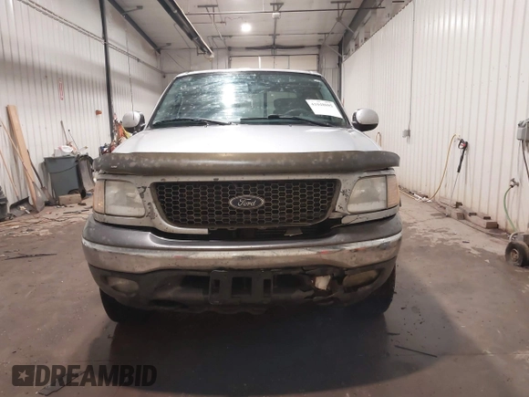 2003 Ford F-150 XLT with VIN 1FTRW08L83KA45989, listed as a IAAI auction lot 41048095 with 226,328 mi miles. Bid and sale history available at carsss.com. Image 13.