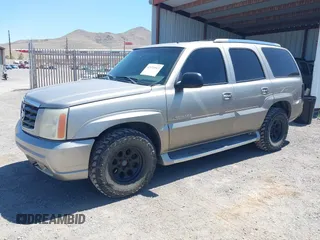 2002 Cadillac Escalade with VIN 1GYEK63N32R139025, listed as a IAAI auction lot 42324563 with 168,338 mi miles and . Bid and sale history available at DreamBid. Image 2.