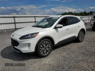2020 Ford Escape Titanium z VIN 1FMCU9J9XLUB19900, wystawiony jako Copart lot #56052105 z przebiegiem 91 575 mil mil oraz Szkoda całkowita • Salvage title. Historia ofert i sprzedaży dostępna na DreamBid. Obrazek 1.
