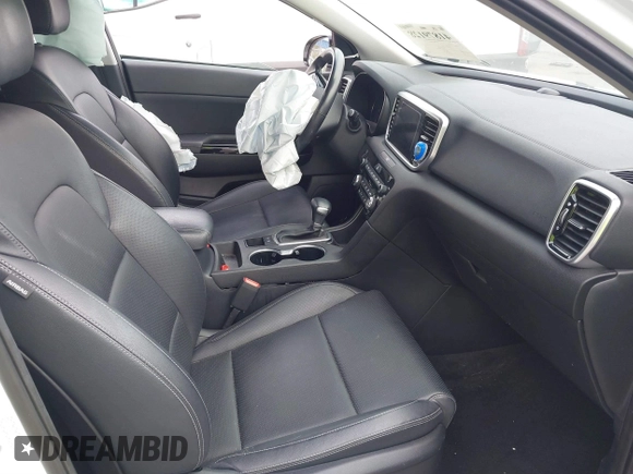 2021 Kia Sportage EX with VIN KNDPN3AC5M7856515, listed as a IAAI auction lot 41879128 with 56,537 mi miles and . Bid and sale history available at DreamBid. Image 5.