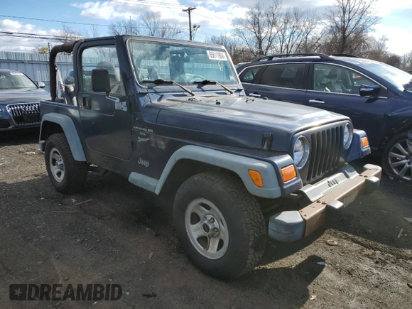 2000 Jeep Wrangler Sport with VIN 1J4FA49S2YP803165, listed as a Copart auction lot 85611904 with 192,427 mi miles and Non repairable. Bid and sale history available at DreamBid. Image 4.