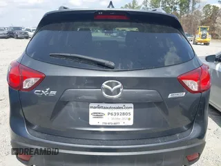 2015 Mazda CX-5 Touring with VIN JM3KE2CY2F0530204, listed as a IAAI auction lot 41788921 with 50,827 mi miles. Bid and sale history available at carsss.com. Image 16.