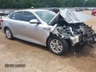 2019 Kia Optima LX with VIN 5XXGT4L30KG282063, listed as a IAAI auction lot 42275740 with 162,447 mi miles and . Bid and sale history available at DreamBid. Image 1.