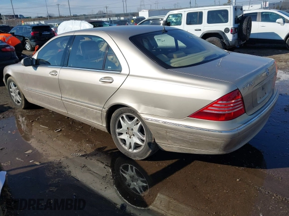 2003 Mercedes-Benz S-Class 4.3L with VIN WDBNG70J73A381880, listed as a IAAI auction lot 41547318 with 136,606 mi miles. Bid and sale history available at carsss.com. Image 3.
