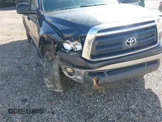 2013 Toyota Tundra 4WD Truck with VIN 5TFDW5F17DX275780, listed as a IAAI auction lot 41710728 with 160,298 mi miles. Bid and sale history available at carsss.com. Image 21.