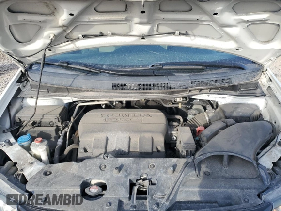 2016 Honda Odyssey SE with VIN 5FNRL5H39GB070652, listed as a Copart auction lot 46358775 with 135,921 mi miles and Salvage Title. Bid and sale history available at DreamBid. Image 14.