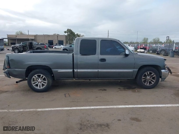 2002 GMC Sierra 1500 SLE with VIN 2GTEC19V121231109, listed as a IAAI auction lot 41906878 with 237,729 mi miles. Bid and sale history available at carsss.com. Image 13.