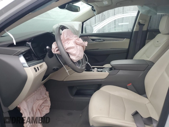 2021 Cadillac XT5 FWD Premium Luxury with VIN 1GYKNCRS0MZ198199, listed as a Copart auction lot 83595494 with 27,923 mi miles and Salvage Title. Bid and sale history available at carsss.com. Image 7.