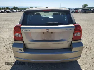 2010 Dodge Caliber SXT z VIN 1B3CB4HA7AD571525, wystawiony jako Copart lot #61651405 z przebiegiem 188 383 mil mil oraz Czysty tytuł • Clean title. Historia ofert i sprzedaży dostępna na DreamBid. Obrazek 6.
