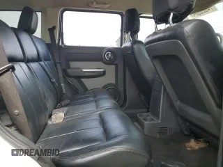 2010 Dodge Nitro SXT z VIN 1D4PT5GK8AW100343, wystawiony jako Copart lot #74628804 z przebiegiem 156 612 mil mil oraz Szkoda całkowita • Salvage title. Historia ofert i sprzedaży dostępna na DreamBid. Obrazek 11.
