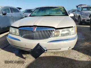 2002 Lincoln Continental with VIN 1LNHM97V32Y694132, listed as a Copart auction lot 76410144 with 0 mi miles and Non Repairable. Bid and sale history available at carsss.com. Image 5.