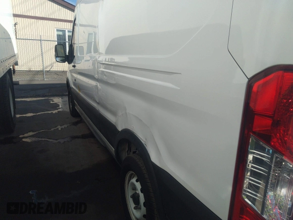 2019 Ford Transit with VIN 1FTYE2CM9KKB09353, listed as a IAAI auction lot 38121359 with 131,124 mi miles and . Bid and sale history available at DreamBid. Image 6.