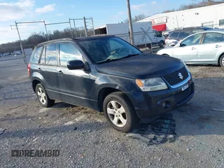 2010 Suzuki Grand Vitara z VIN JS3TE0D4XA4100453, wystawiony jako IAAI lot #41603012 z przebiegiem 210 039 mil mil oraz . Historia ofert i sprzedaży dostępna na DreamBid. Obrazek 1.