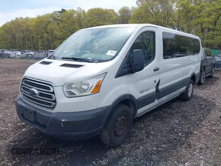 2015 Ford Transit XL with VIN 1FBZX2ZM8FKA20339, listed as a IAAI auction lot 42186096 with Not provided miles and . Bid and sale history available at DreamBid. Image 2.
